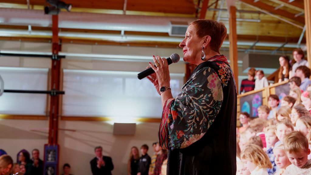 Donna speaking to audience